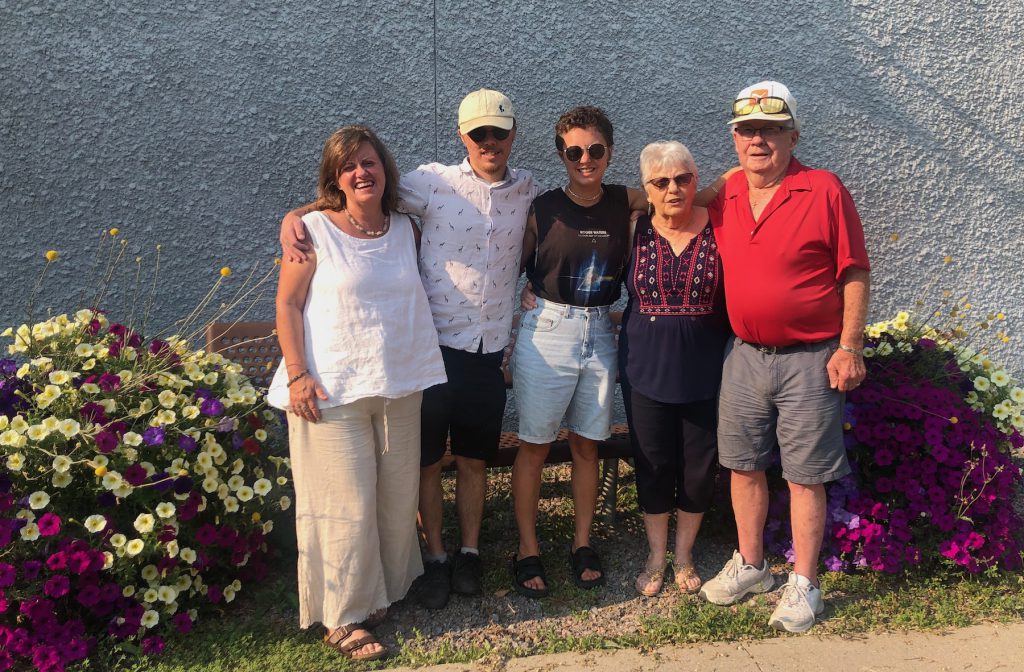 Writer Leanne Fournier posing for a photo with her children Ren and Everette and parents Glenn and Aggie Hibbert