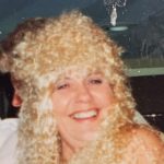 Woman in curly wig