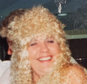 Woman in curly wig