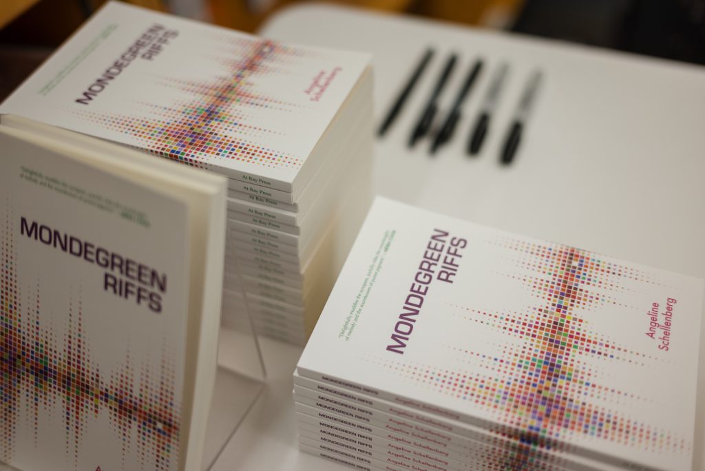 Stack of books entitled Mondegreen Riffs.